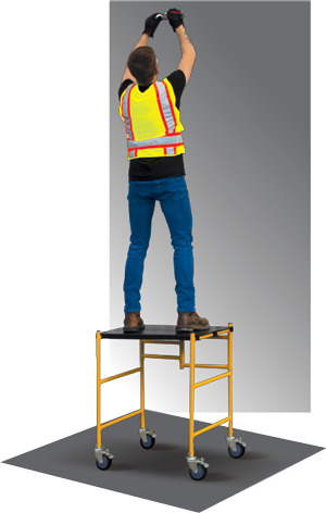 A user standing on the platform at max height.