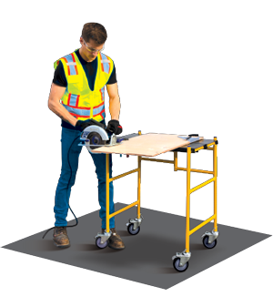 A user using the platform as a work table to cut wood.